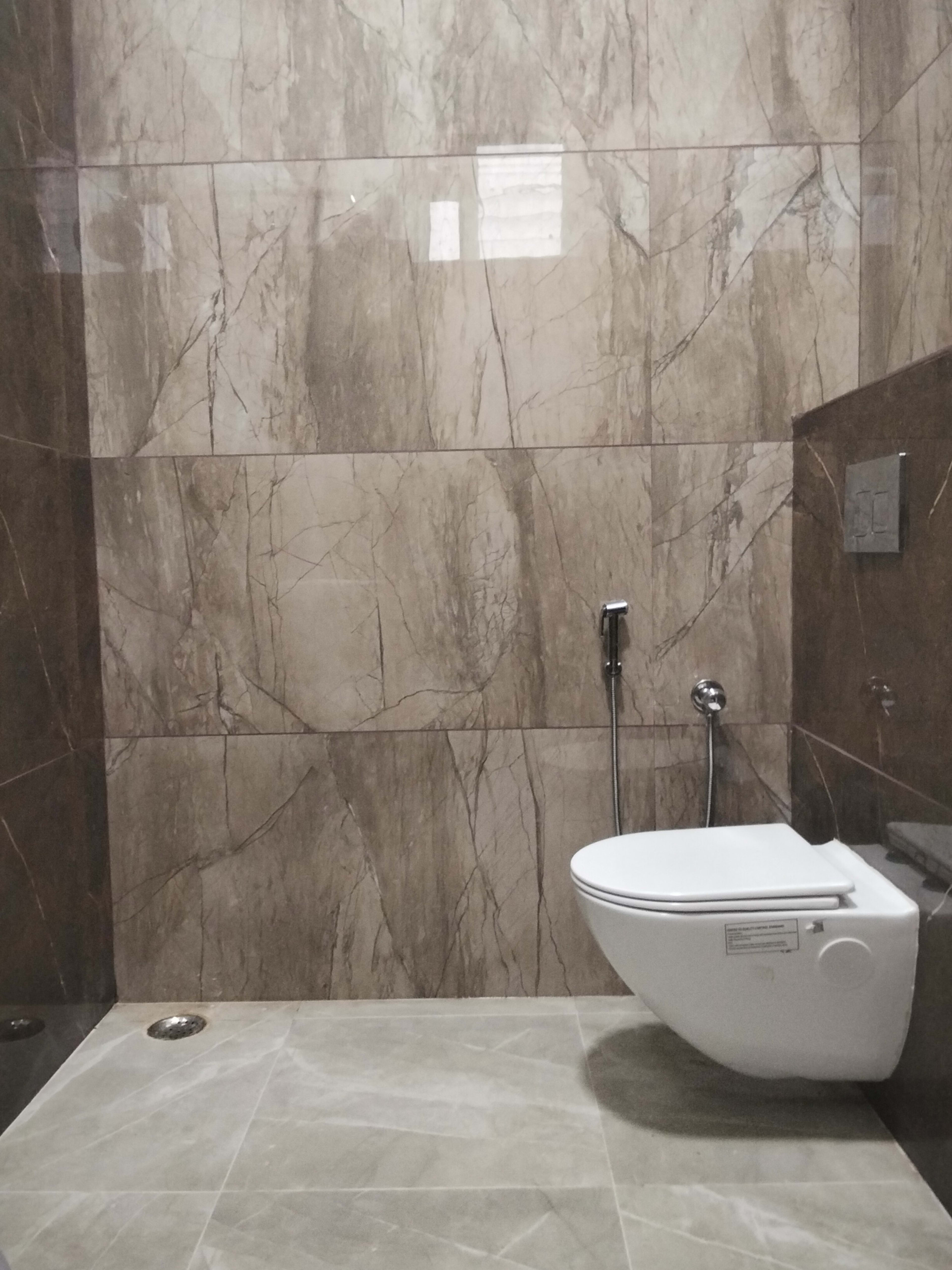 Clean private bathroom in the Business Comfort Room — UJ Pallazzio, Tiruvannamalai