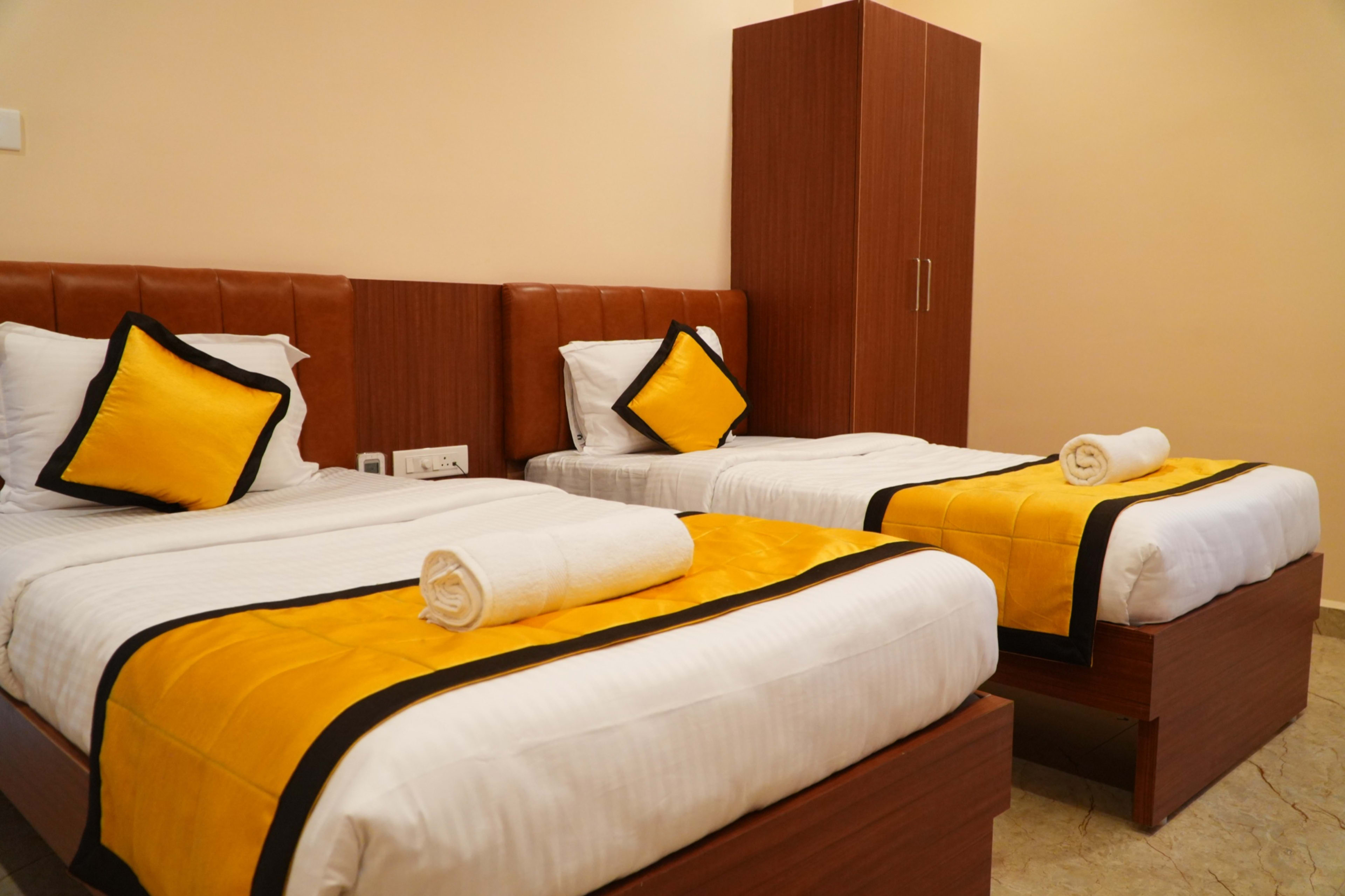 Luxury twin-bed room for families — UJ Pallazzio, Tiruvannamalai