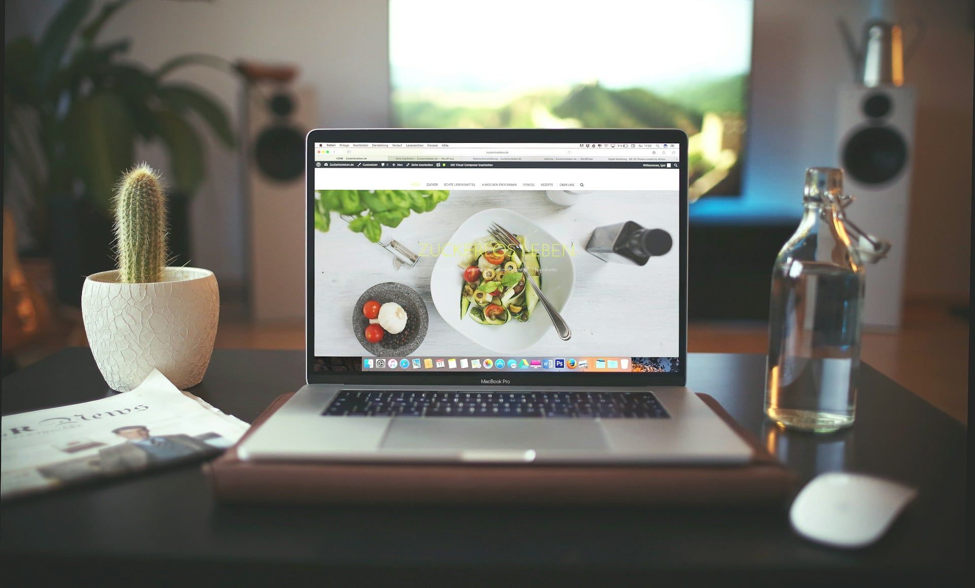 A laptop showcasing a modern website for a restaurant or food blog