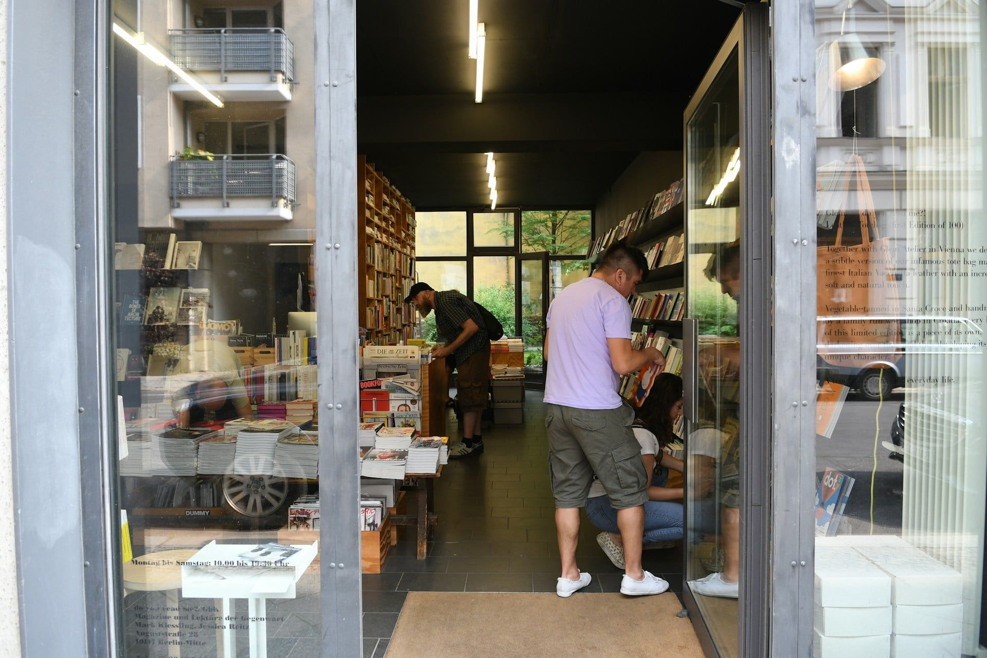Customers shopping for books in a bookstore and having a positive experience