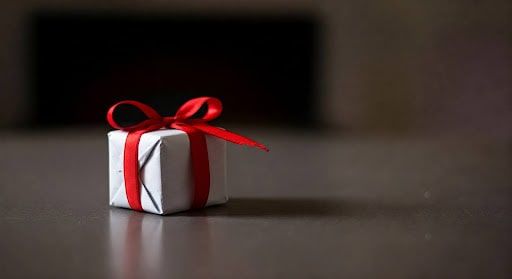 A small present wrapped and on a table