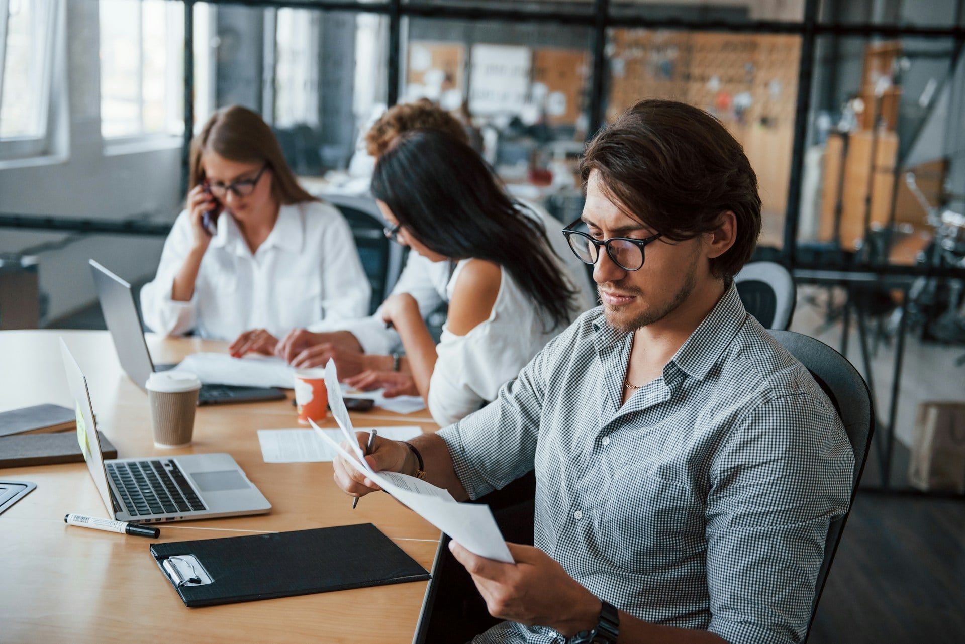 A marketing team going through the metrics and analytics of their business