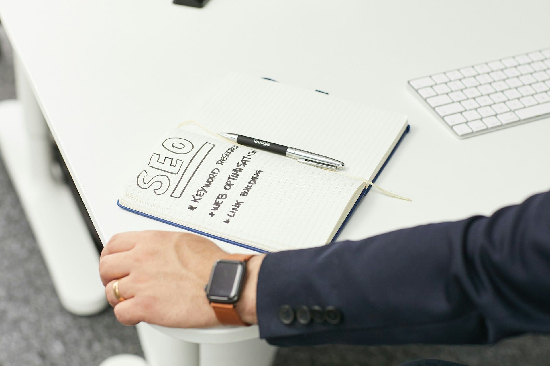An open notebook on a desk with several strategies bullet pointed on it