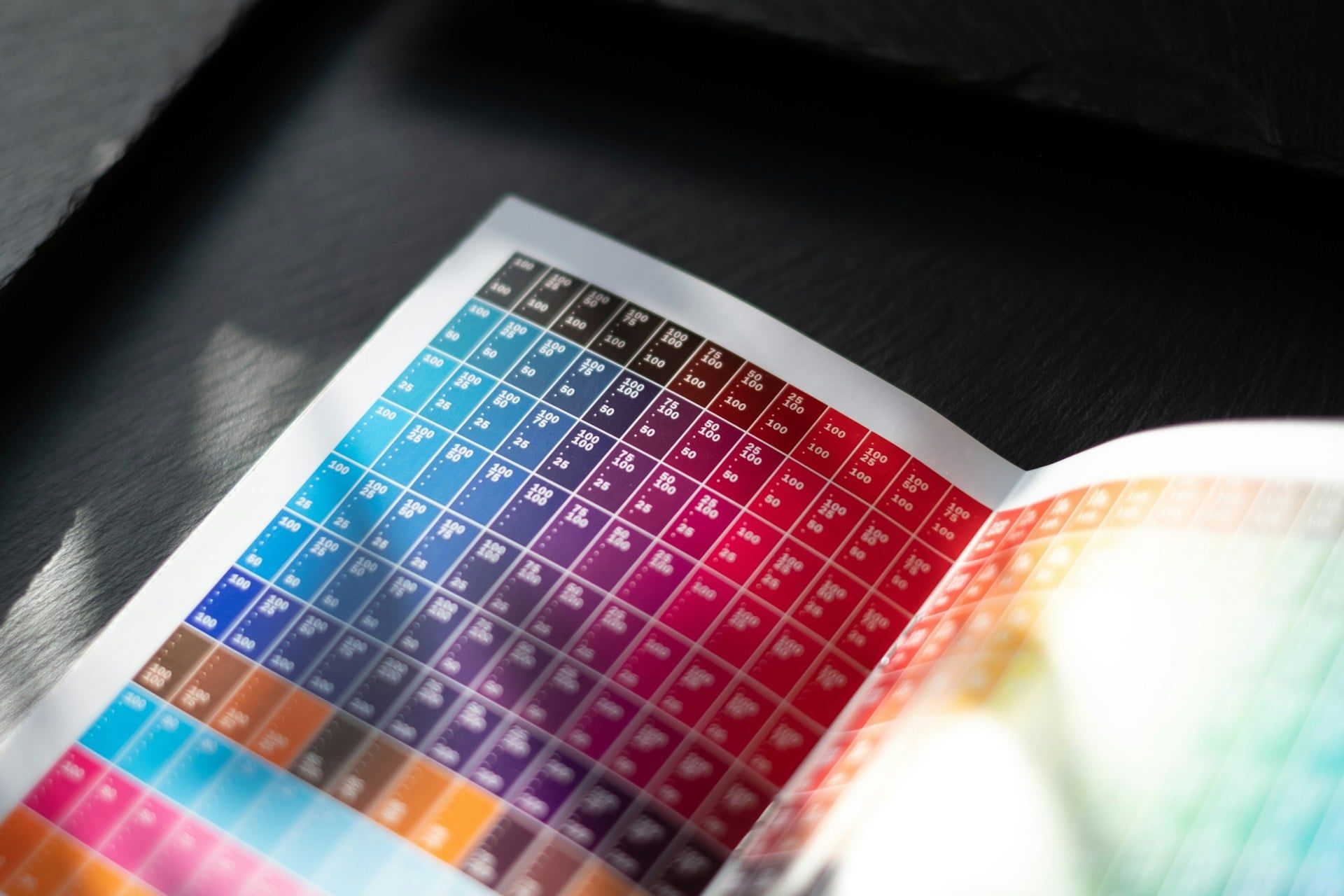 An open design catalogue with a selection of different colours and codes