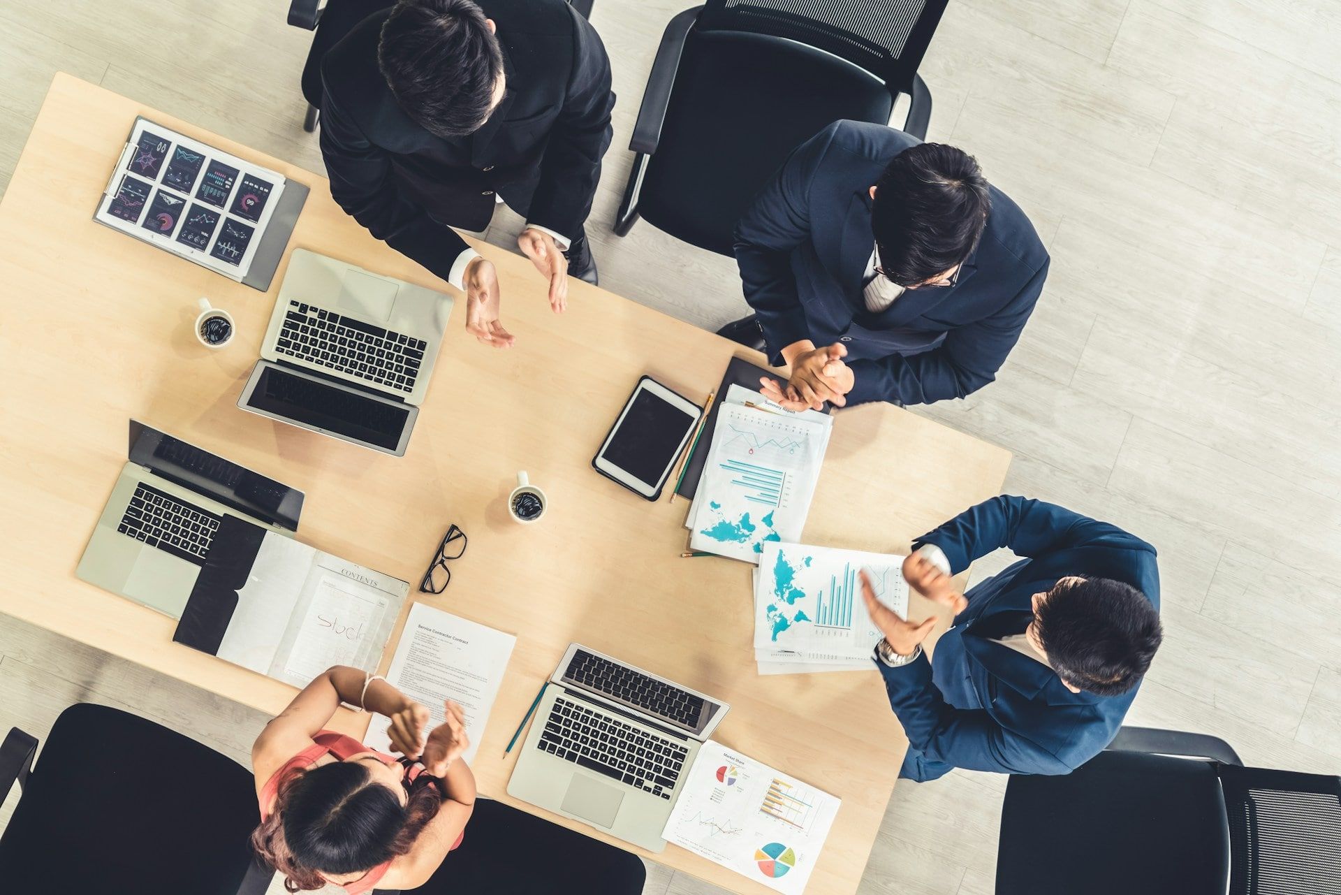 A top-down view of a marketing team working on a project