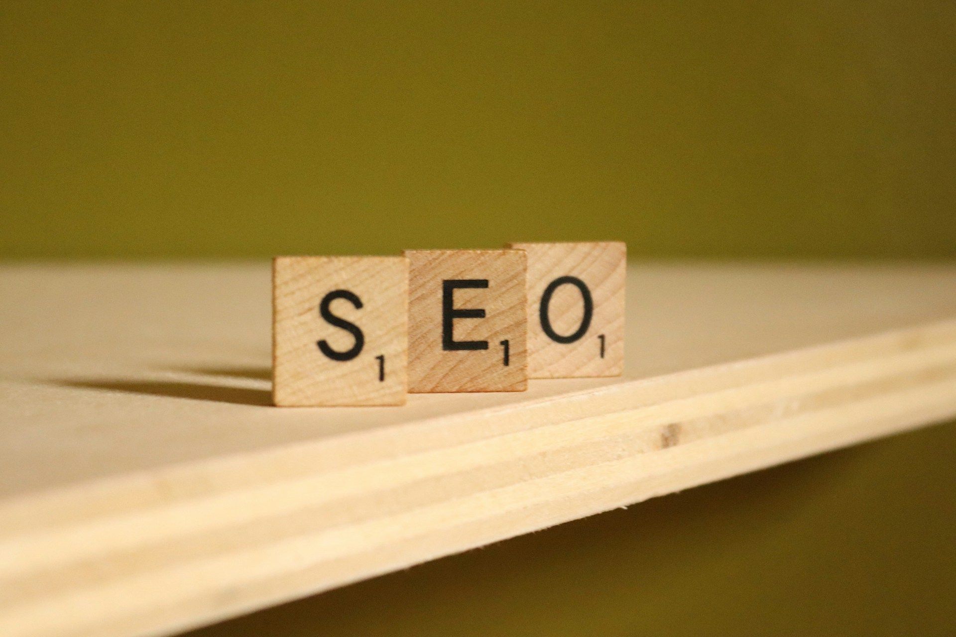 hree Scrabble tiles lined up that read “SEO”