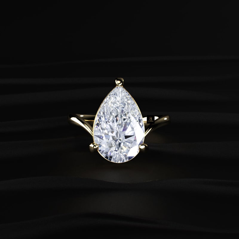 Signature Teardrop Pear Cut Diamond Solitaire Ring RG1024