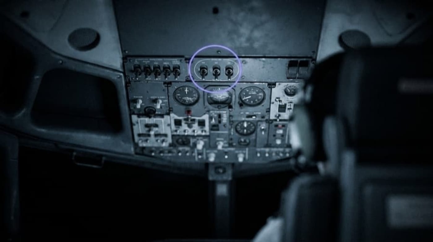 A close-up of aircraft cockpit controls and instruments