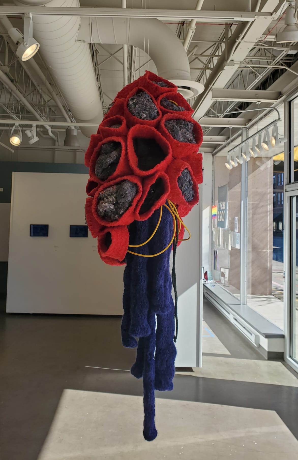Gina Lee Robbins, Bushwhacking, reclaimed knitted wool and acrylic, wire, found objects, installation variable (suspended or pedestal) 35 X 17 X 17” (image 2)
