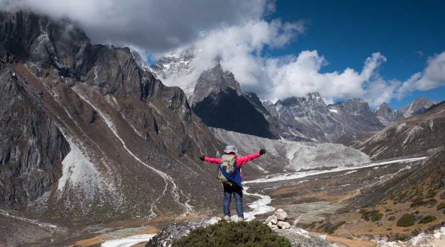 trekker in lap of himalaya
