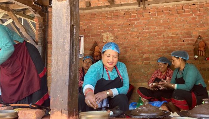 local newari women preparing traditional cusine