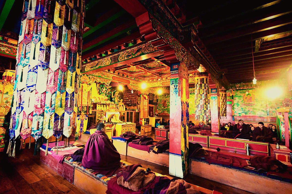 monk inside tengboche monastery