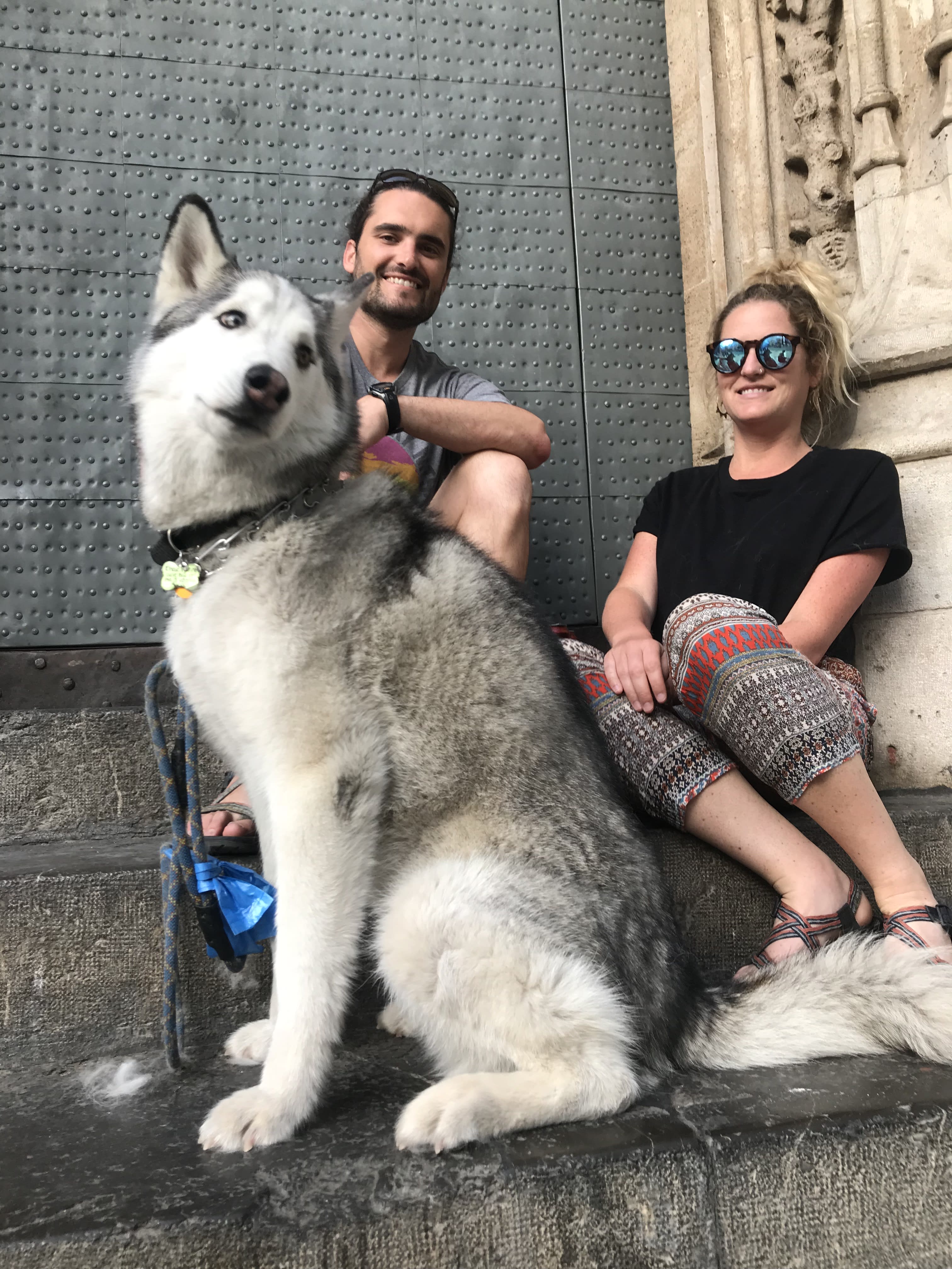 Chase Warrington, his wife Allison, and their dog Koda in Valencia, Spain, where they are living on long-stay visas