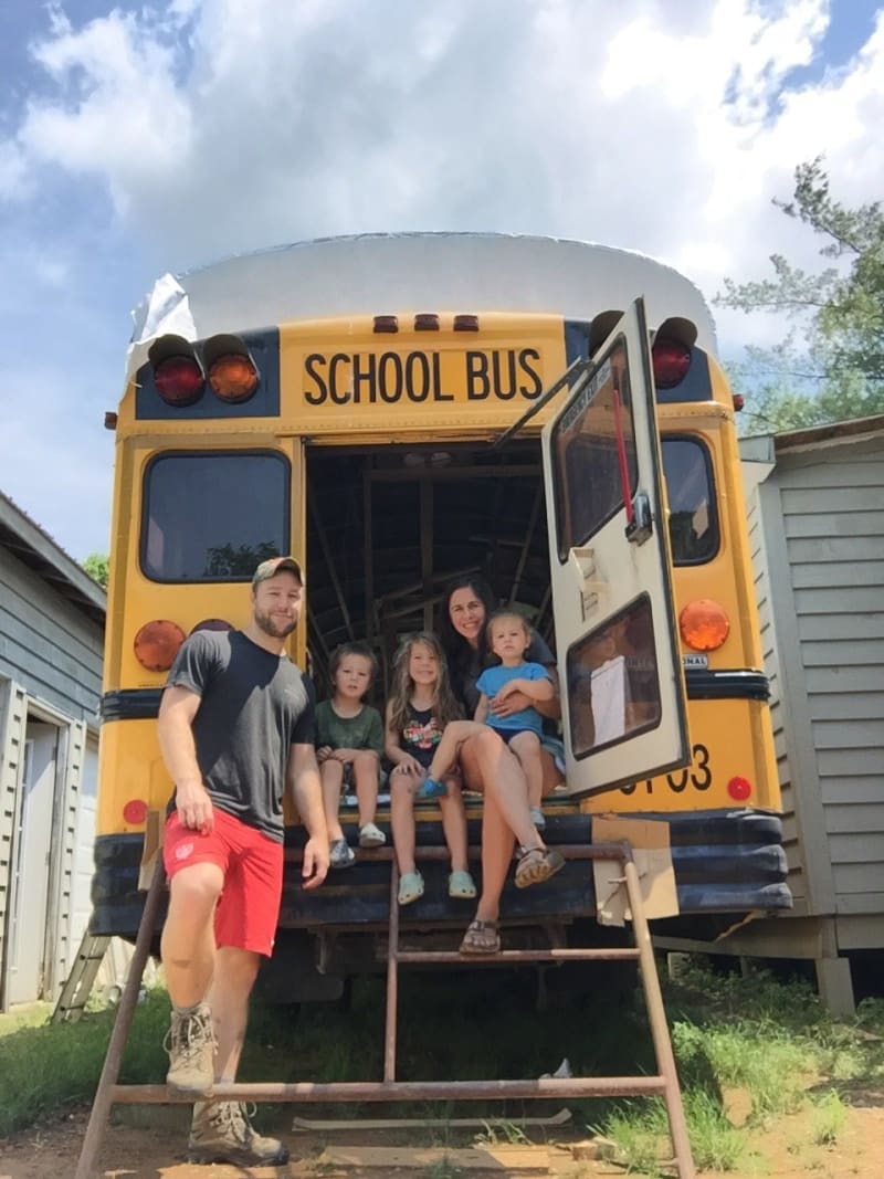 The Mills family on the school bus they are renovating to travel the country. From left to right: Jon, Seth, Kaitlyn, Elyse, and Katie.   Source: Katie Mills