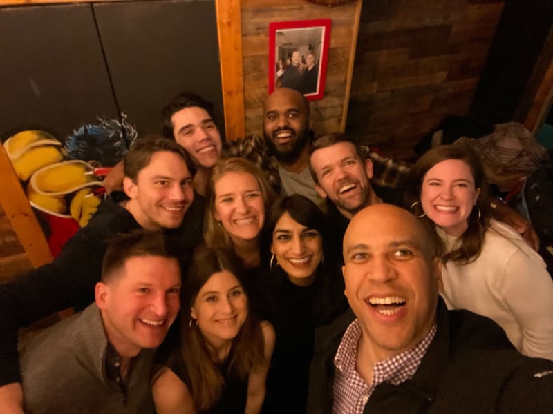 Alex with Cory Booker and the rest of the presidential campaign's communications team