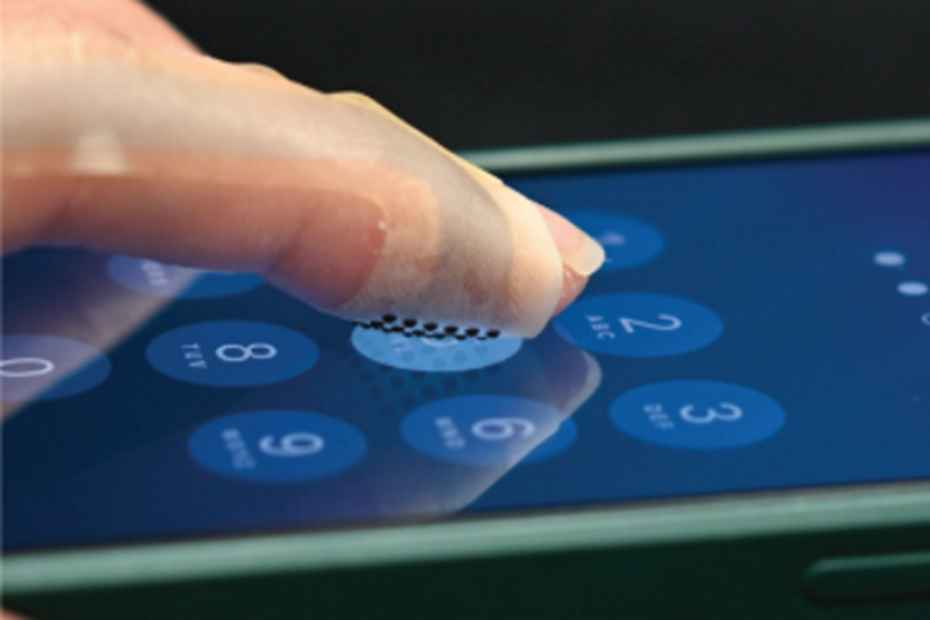 Haptic wearable that looks like a finger plaster can feel textures on a touch display