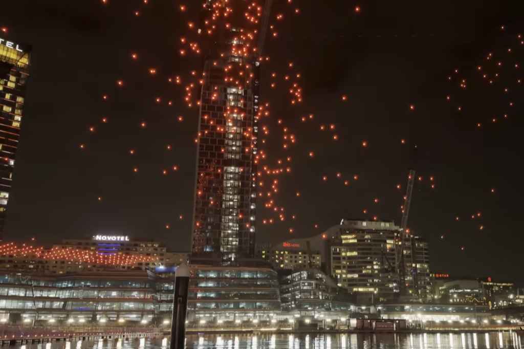 Vivid Sydney drone show suspended after technical fault sends drones into harbour