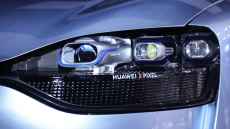 Headlight projectors turn car into drive-in movie theatre