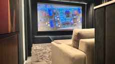 Intimate luxury: Crafting home cinema in a cosy garden cabin