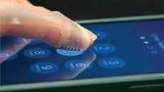 Haptic wearable that looks like a finger plaster can feel textures on a touch display