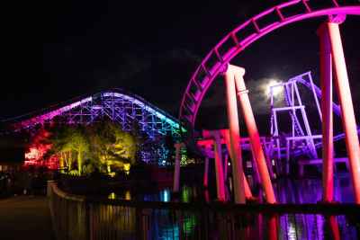 Adam Hall Cameo spotlights illuminate theme park special event