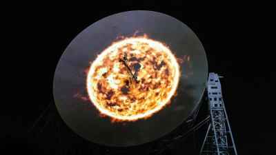 Giant radio telescope transformed for space light show