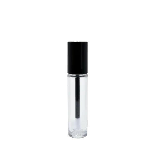 The image shows the JCOP 0.3oz PETG Lip Gloss Tube. The tube is clear, allowing the contents to be visible, and has a cylindrical shape with a rounded base. It includes a silver-colored cap that twists off, revealing an applicator wand inside. The overall design is sleek and modern, with a minimalist aesthetic that highlights the product within. The tube appears to be empty in this particular image.