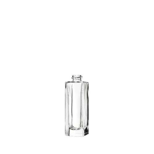 The image shows the Calaso 1.0oz Glass Bottle. It is a small, clear glass bottle with a cylindrical shape. The bottle has a smooth, transparent surface and a flat base. The neck of the bottle is relatively short and widens slightly at the top, where it is sealed with a screw cap. The cap appears to be made of a metal or plastic material and is designed to securely close the bottle. The overall design is sleek and minimalist, suitable for storing various liquids.