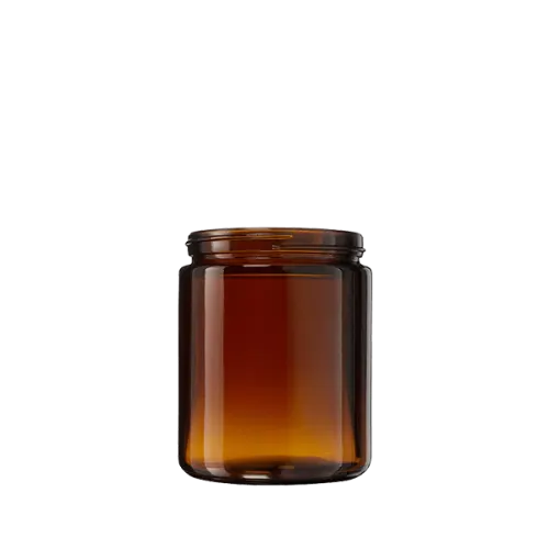 The image showcases the Calaso 8.5oz Glass Jar. The jar has a clear, transparent body with smooth, straight sides and a wide opening at the top. The jar's minimalist design highlights its clean lines and simple elegance. The lid is not shown in the image.