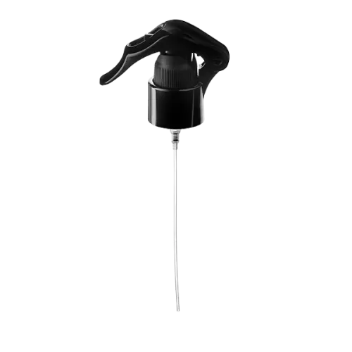 The image shows a Calaso PP Sprayer 24/410. It is a white plastic trigger sprayer with a ribbed neck and a long, thin nozzle. The trigger is ergonomically designed for ease of use, and the sprayer is intended for attaching to bottles for dispensing liquids in a fine mist. The overall design is clean and functional.