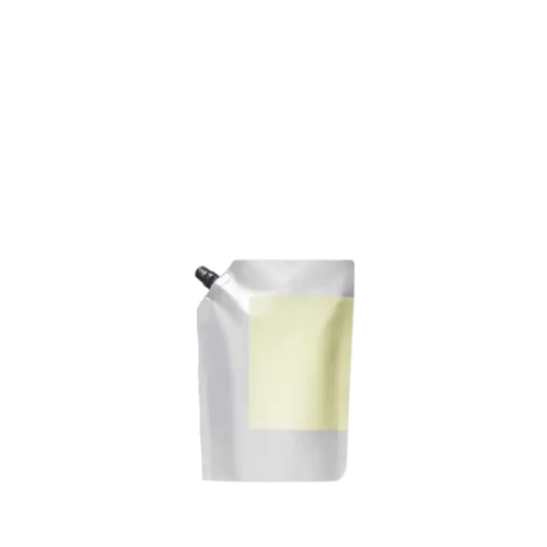 The image shows the Identipak 1.7oz PE Pouch, Spouted Refill Pouch. The pouch is white with a smooth, glossy finish and has a spout at the top for easy dispensing. The shape of the pouch is flexible and designed to stand upright. The spout is capped with a screw-on lid. The overall design is minimalistic and functional, suitable for holding liquids or semi-liquids.