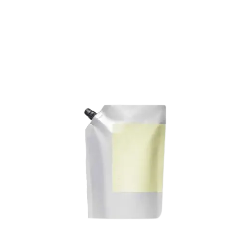 The image showcases the Identipak 5 oz PE Pouch Spouted Refill Pouch (150ml). This is a flexible, semi-transparent plastic pouch with a spout on the top right corner for easy dispensing. The pouch is empty, standing upright with a smooth surface. The spout is white and features a screw cap for secure closure. The overall design is simple and functional, emphasizing convenience for refilling purposes.