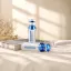 Queens Packaging Co., ltd.  1.7oz / 50ml AS Cylinder Airless Pump Bottle with Clear AS Overcap & Domed Pump Actuator, 0.2cc Dosage
