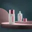 Queens Packaging Co., ltd.  1.7oz / 50ml PE Round Tottle with Integrated Dropper Nozzle & Overcap with Push-Button Release