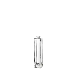 The image displays the Calaso 3.4oz Glass Bottle. The bottle is clear, showcasing a sleek, cylindrical shape with smooth, transparent glass. It features a narrow neck and is topped with a silver screw cap. The overall design is clean and minimalist, suitable for various liquid products. The clear glass allows the contents to be visible, and the bottle's simple elegance makes it ideal for both functional and decorative uses.