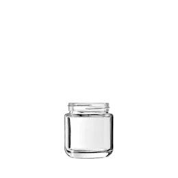 The image shows a Calaso 3.4oz Glass Jar (HM14012-100). The jar is cylindrical with a smooth, transparent surface and a wide opening. It has a threaded neck designed for a screw-on lid, which is not shown in the image. The glass is clear, allowing the contents to be visible when filled. The jar is empty and stands upright, showcasing its simple yet functional design.