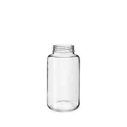 The image shows the Calaso 10.1 oz Glass Jar. It is a clear, cylindrical glass jar with a smooth surface and a wide opening at the top. The jar has a simple, elegant design, making it suitable for various uses. The lid is not shown in this image. The glass is transparent, allowing the contents to be easily visible. The overall appearance is clean and minimalist.