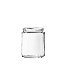 The image shows the Calaso 8.5oz Glass Jar by Glasmeister. The jar is clear and cylindrical with smooth, straight sides and a wide mouth. The glass appears to be thick and sturdy, and the jar is empty. The design is simple and modern, suitable for various uses such as storage or packaging. The background of the image is white, highlighting the transparency and clarity of the glass jar.