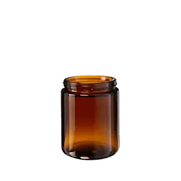 The image features the Glasmeister 8.5oz Glass Jar (SM210001-699). The jar is a clear, cylindrical glass container with a smooth surface. It has a wide-mouth opening and a screw-top finish, suitable for a lid (not shown in the image). The jar is empty and displayed against a plain white background, highlighting its transparent nature and simple, elegant design.
