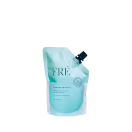 The image shows a clear, flexible plastic pouch with a white spout cap on top. The pouch is the Expack 7.1oz PE Pouch Mono UniSpout 210ml. The body of the pouch is transparent, allowing the contents to be visible. The spout cap is positioned centrally at the top of the pouch, designed for easy pouring or dispensing. The pouch is free-standing with a flat bottom, which provides stability when placed on a surface. There are no labels or text on the pouch in the image.