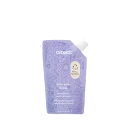 The image shows the Expack 25.0oz PE Pouch (Mono UniSpout 739ml). It is a sleek, transparent plastic pouch with a spout located at the top left corner. The pouch appears to be empty and is standing upright. The spout has a screw cap for easy opening and closing. The overall design is functional and modern, suitable for holding liquid products. The transparency of the pouch allows for the contents to be visible.