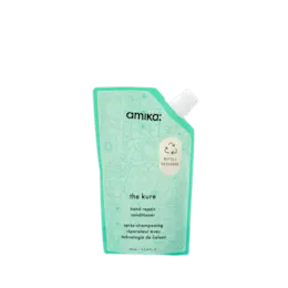 The image shows a 300ml PCR UniSpout pouch. The pouch is white and features a spout on the top right corner for easy dispensing. It has a flat base, allowing it to stand upright. The overall shape is slightly rectangular with rounded edges. There are no labels or additional text visible on the pouch.