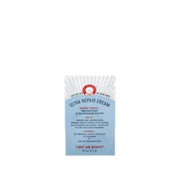 The image shows a flat, rectangular sachet with a sleek, minimalist design. The sachet is predominantly white with a smooth texture. At the top, there is a small, circular hole, likely for hanging or displaying the product. The front of the sachet prominently features the product name "Identipak 1.4oz PE Sachet" in clear, bold text. The overall appearance is clean and professional, suitable for containing small amounts of liquid, gel, or cream products.