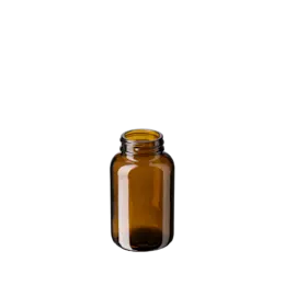 The image shows the Calaso 4.1oz Glass Jar (GX320002-679 Juniper). The jar is cylindrical with a smooth, clear glass body and a wide opening. It features a flat base and straight sides, making it ideal for storage. The glass is transparent, allowing the contents inside to be visible. The jar is topped with a matching, flat, and secure lid. The overall design is sleek and minimalistic.