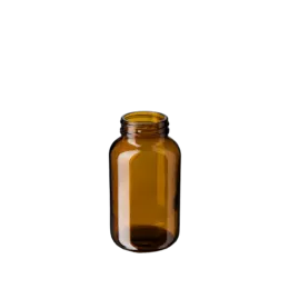 The image shows the Calaso 8.5oz Glass Jar GX320005-679 in Juniper color. The jar is cylindrical with a smooth, transparent glass surface. It features a wide mouth opening at the top, ideal for easy filling and access. The Juniper color adds a subtle, elegant tint to the glass, giving it a refined appearance. The jar is empty and displayed against a plain, white background.