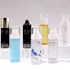 Mingdun Packaging 1.7oz/50ml PETG Cylinder Cosmetic Bottle with Fine Mist Sprayer & Flush Overcap, 18mm Neck