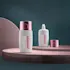 Queens Packaging Co., ltd. 1.7oz / 50ml PE Round Tottle with Integrated Dropper Nozzle & Overcap with Push-Button Release