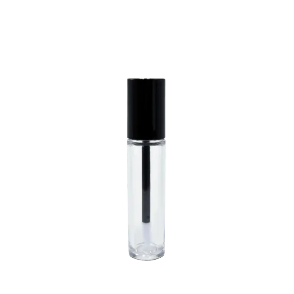 The image shows the JCOP 0.3oz PETG Lip Gloss Tube. The tube is clear, allowing the contents to be visible, and has a cylindrical shape with a rounded base. It includes a silver-colored cap that twists off, revealing an applicator wand inside. The overall design is sleek and modern, with a minimalist aesthetic that highlights the product within. The tube appears to be empty in this particular image.