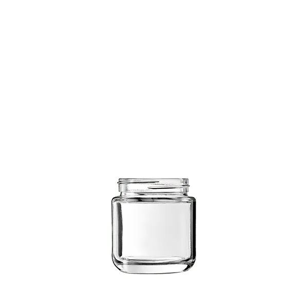 The image shows a Calaso 3.4oz Glass Jar (HM14012-100). The jar is cylindrical with a smooth, transparent surface and a wide opening. It has a threaded neck designed for a screw-on lid, which is not shown in the image. The glass is clear, allowing the contents to be visible when filled. The jar is empty and stands upright, showcasing its simple yet functional design.