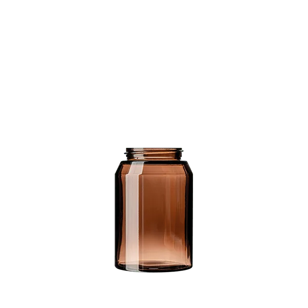 The image shows the Calaso 6.4oz Glass Jar. The jar has a clear, cylindrical body with smooth, straight sides and a wide opening at the top. The base of the jar is flat, and the glass appears thick and durable. There is no lid visible in the image. The jar is empty and showcased against a plain, white background.